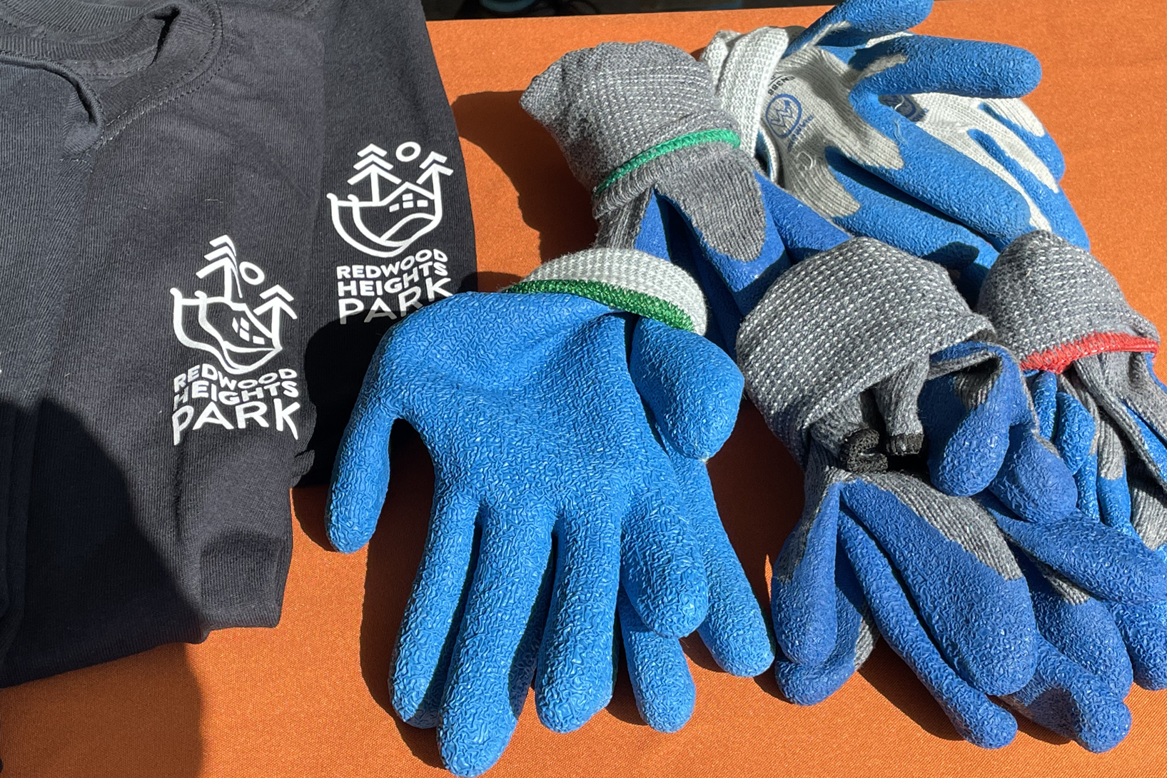 RHA Events: Redwood Heights Park shirts and work gloves for an Earth Day event