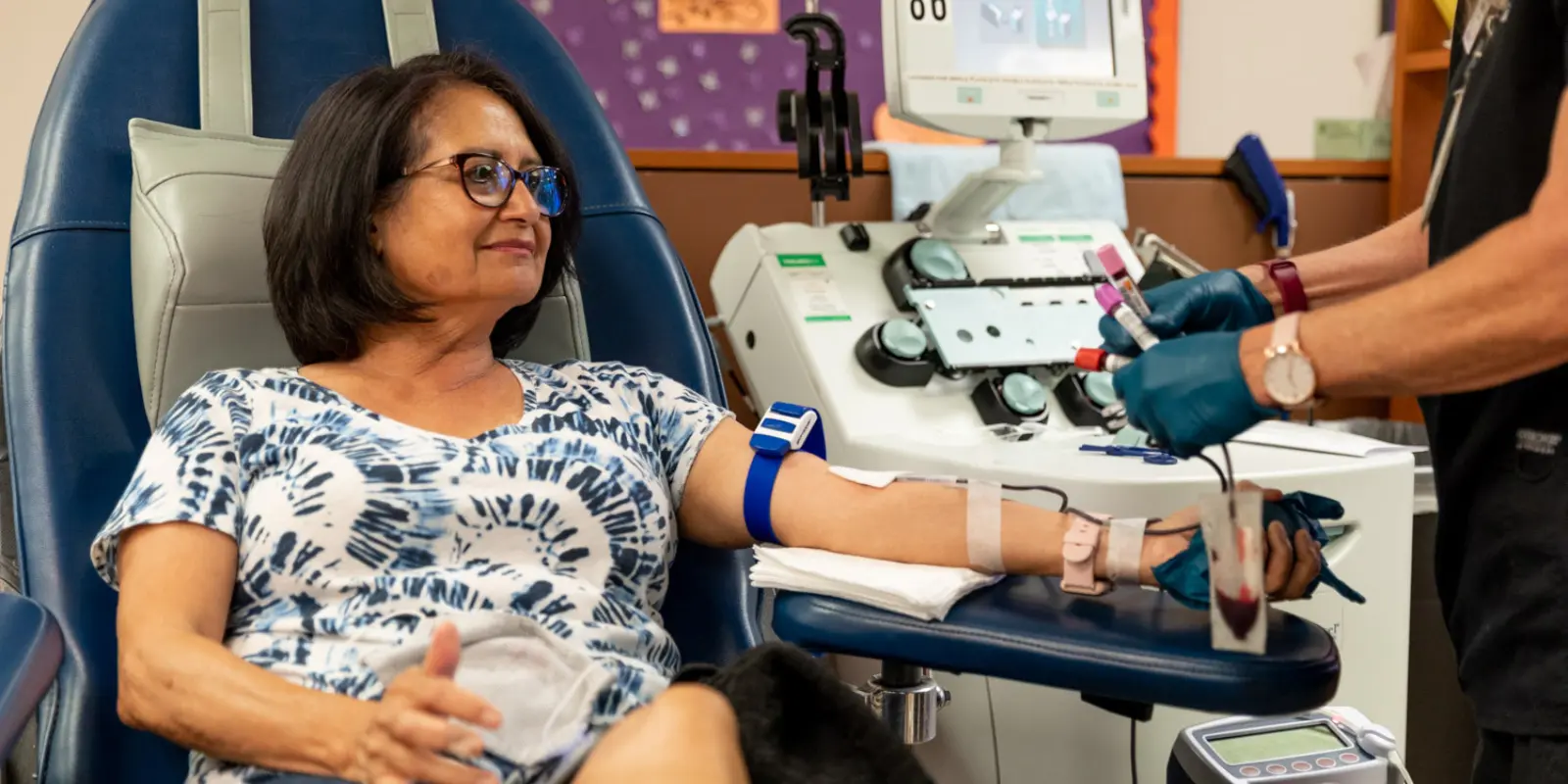 Woman donating at Vitalant blood drive